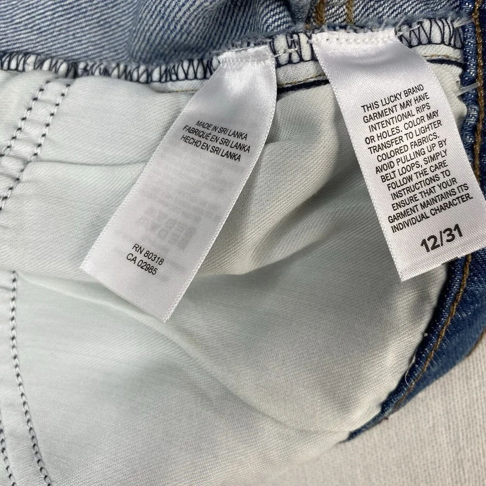 Lucky Brand Women's Sz 12/31 90s‎ Midi Shorts High Rise Raw Hem Medium Wash